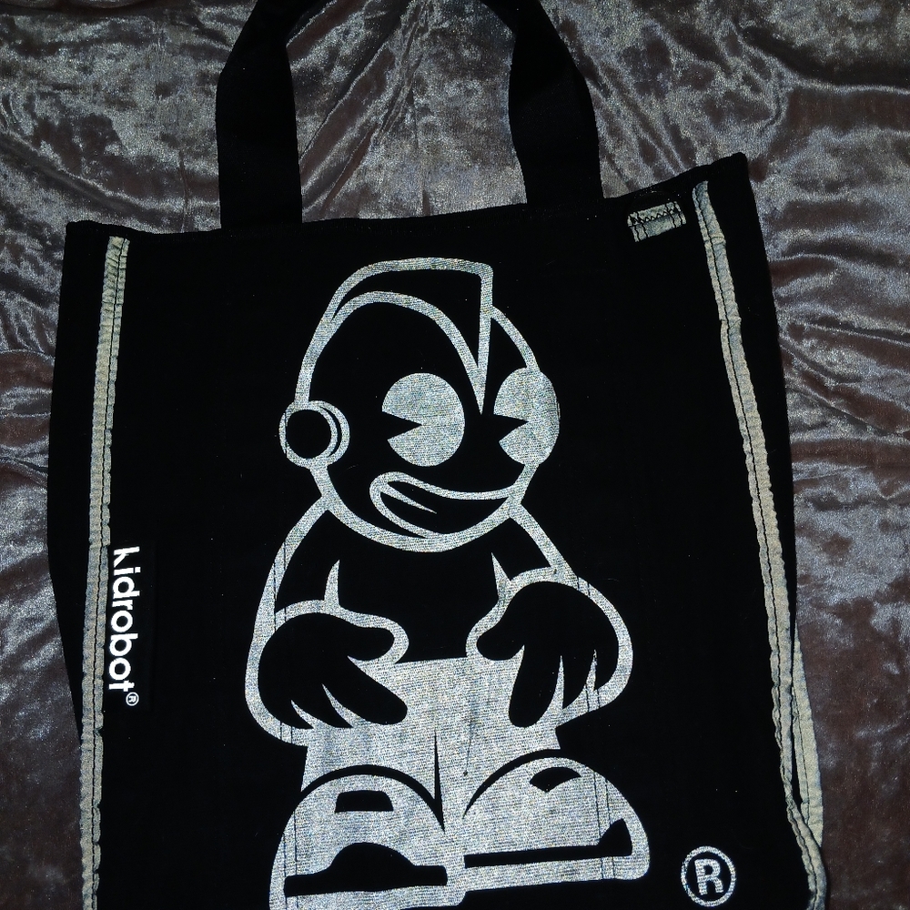 Kid Robot reversible reflect bag. 18 years old collectible bag